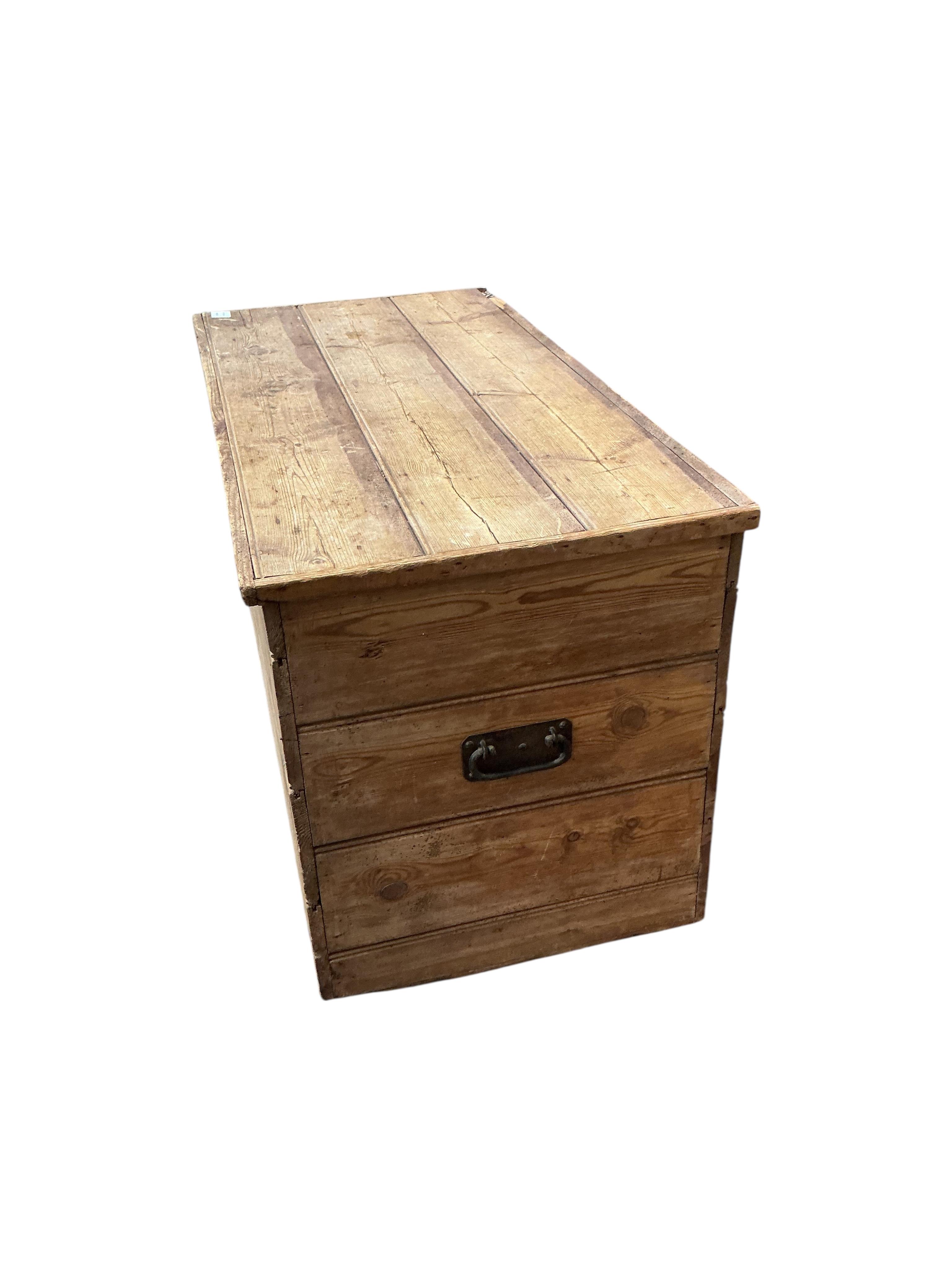 A Victorian pine trunk, width 105cm, depth 53cm, height 59cm